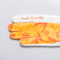 Golf glove [tropical] (orange) worn on left hand