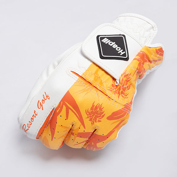 Golf glove [tropical] (orange) worn on left hand